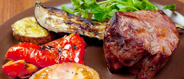 Eating beef steak in Argentina
