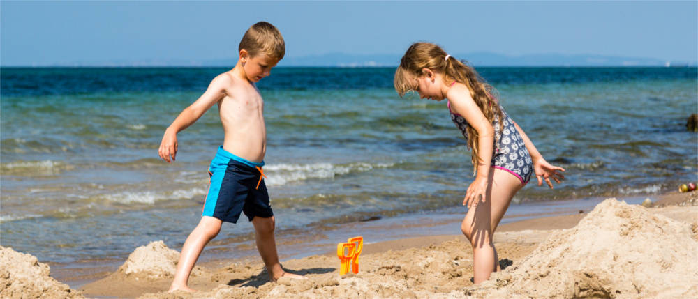 Children playing at the beach