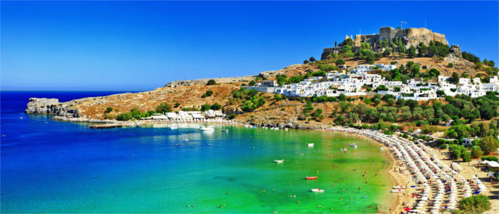 Beach and castle Lindos on Rhodes