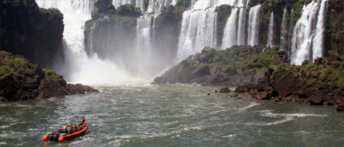 Taking a boat to the waterfall